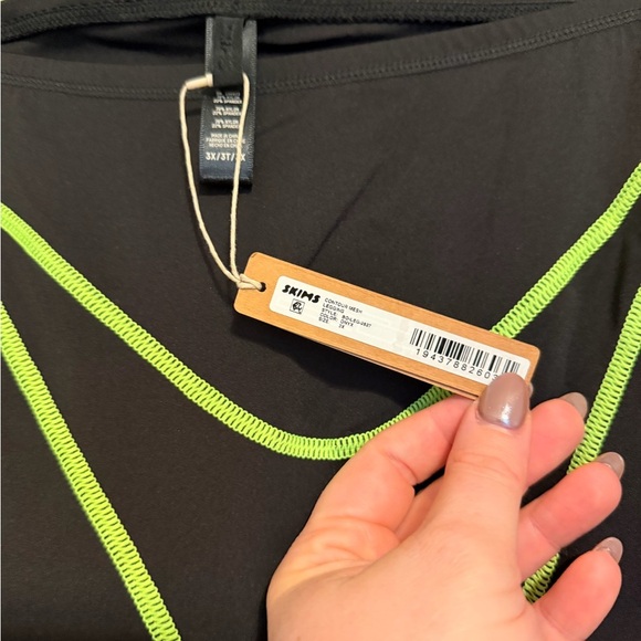 SKIMS Black Leggings with Neon Green Trim - Picture 2 of 3